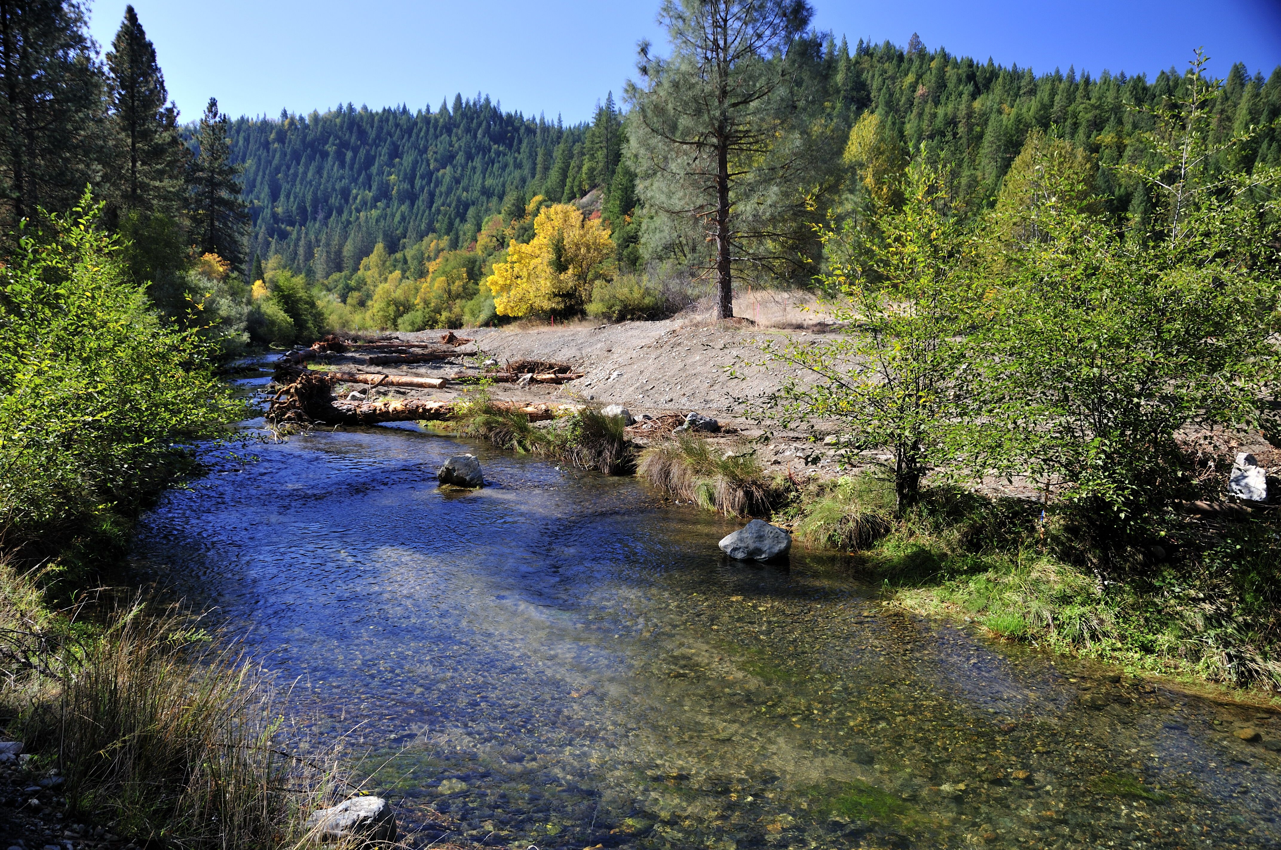 Photo by Kenneth DeCamp, purchased by the USBR Trinity River Restoration Program. Side channel at the Sawmill Rehabilitation site.