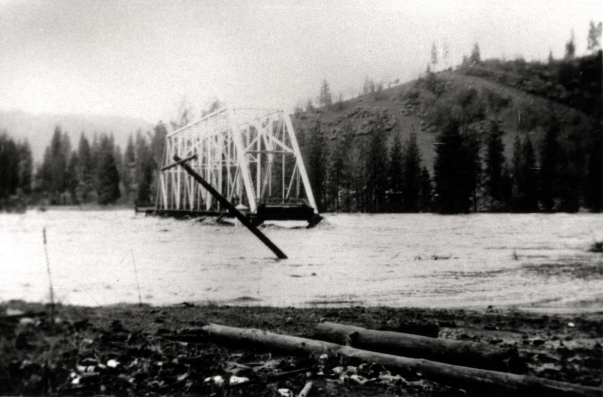 Lewiston Old Bridge during an historic flood. The highest flow calculated by USGS in Lewiston was 71,600 cfs on December 22nd, 1955. Photograph by Boni DeCamp, provided by Kenneth DeCamp.